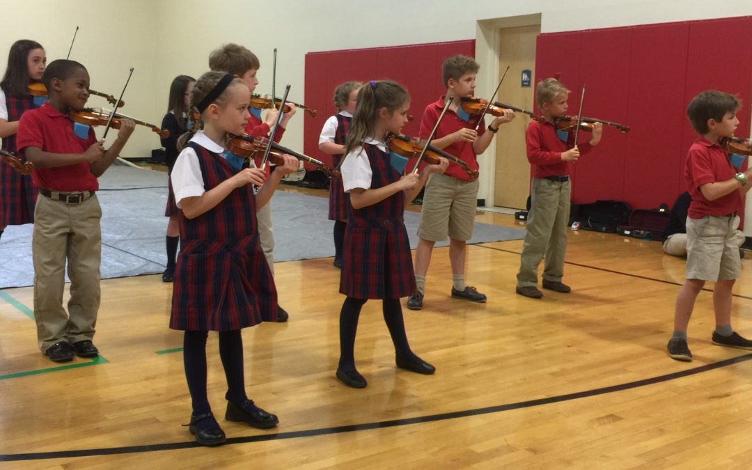 Student Violin Orchestra Performance Highlights Accomplishments